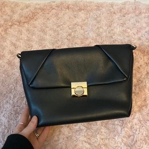 A new day black purse